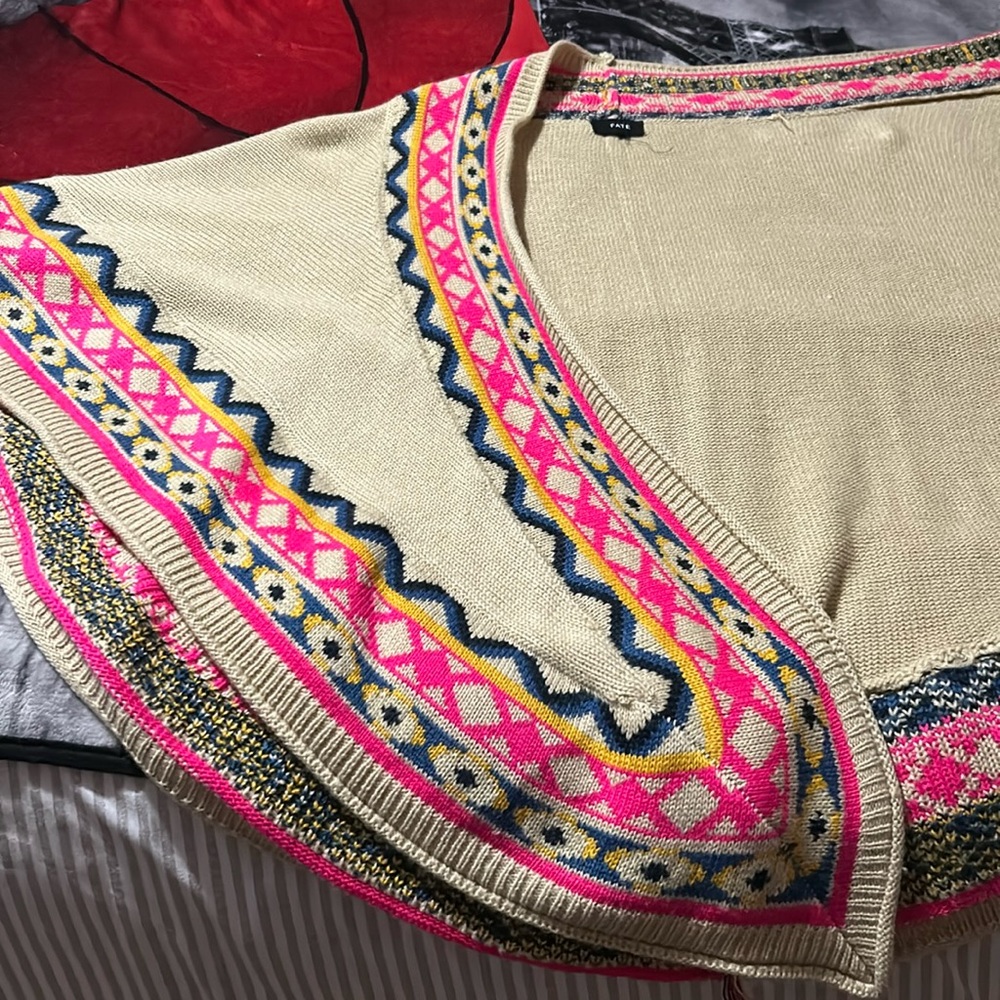 It’s a woman’s shawl nice colors